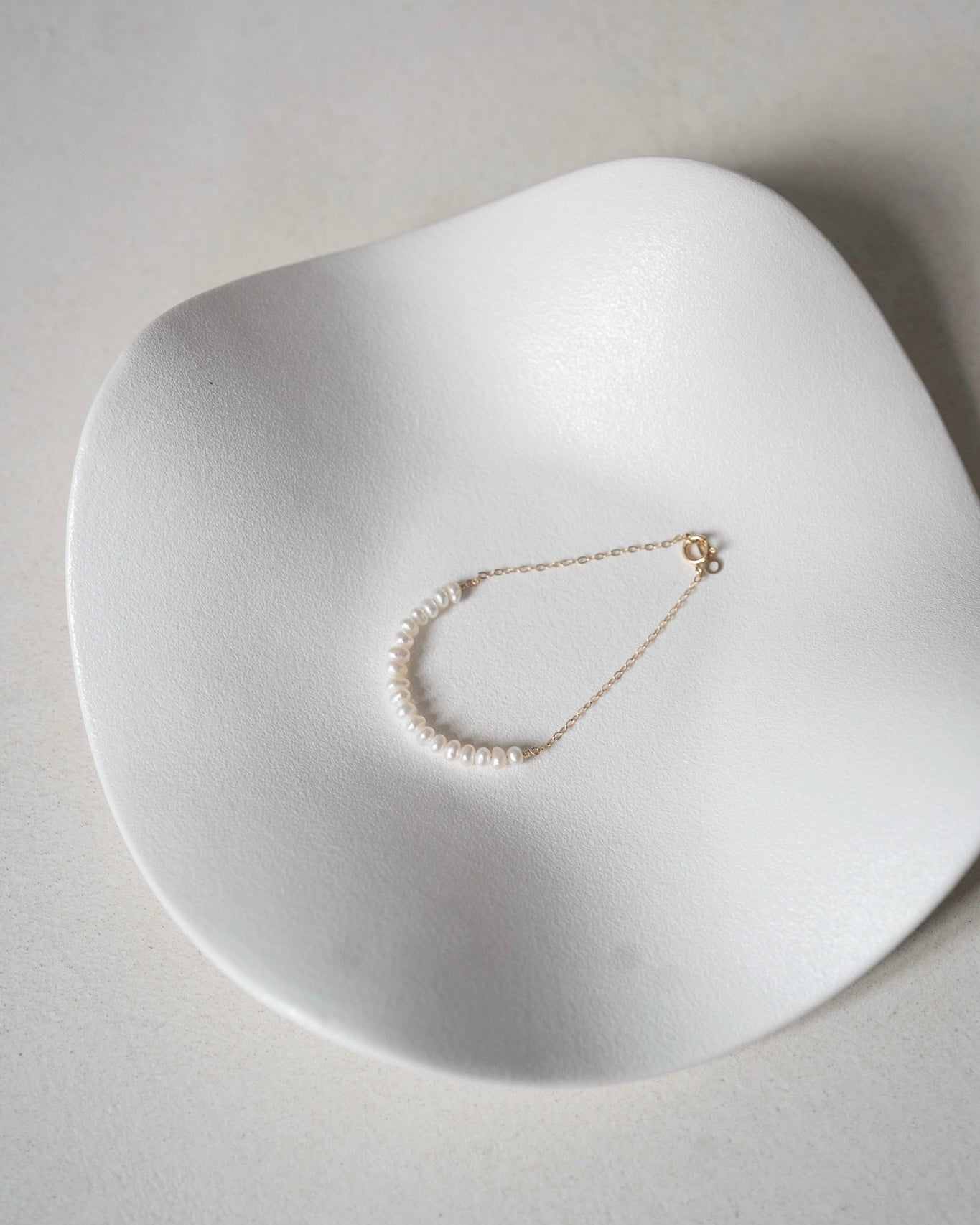 Smiley pearl bracelet