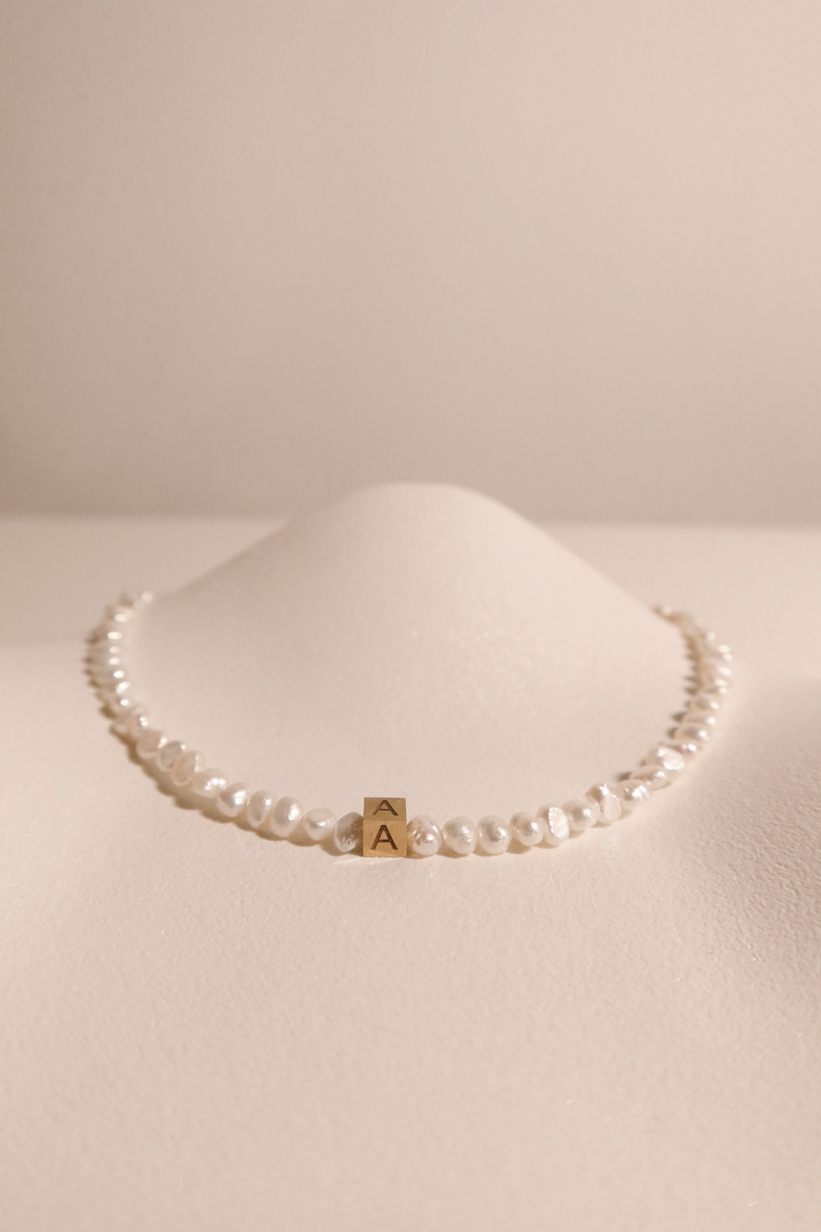Rocks Initial pearl necklace