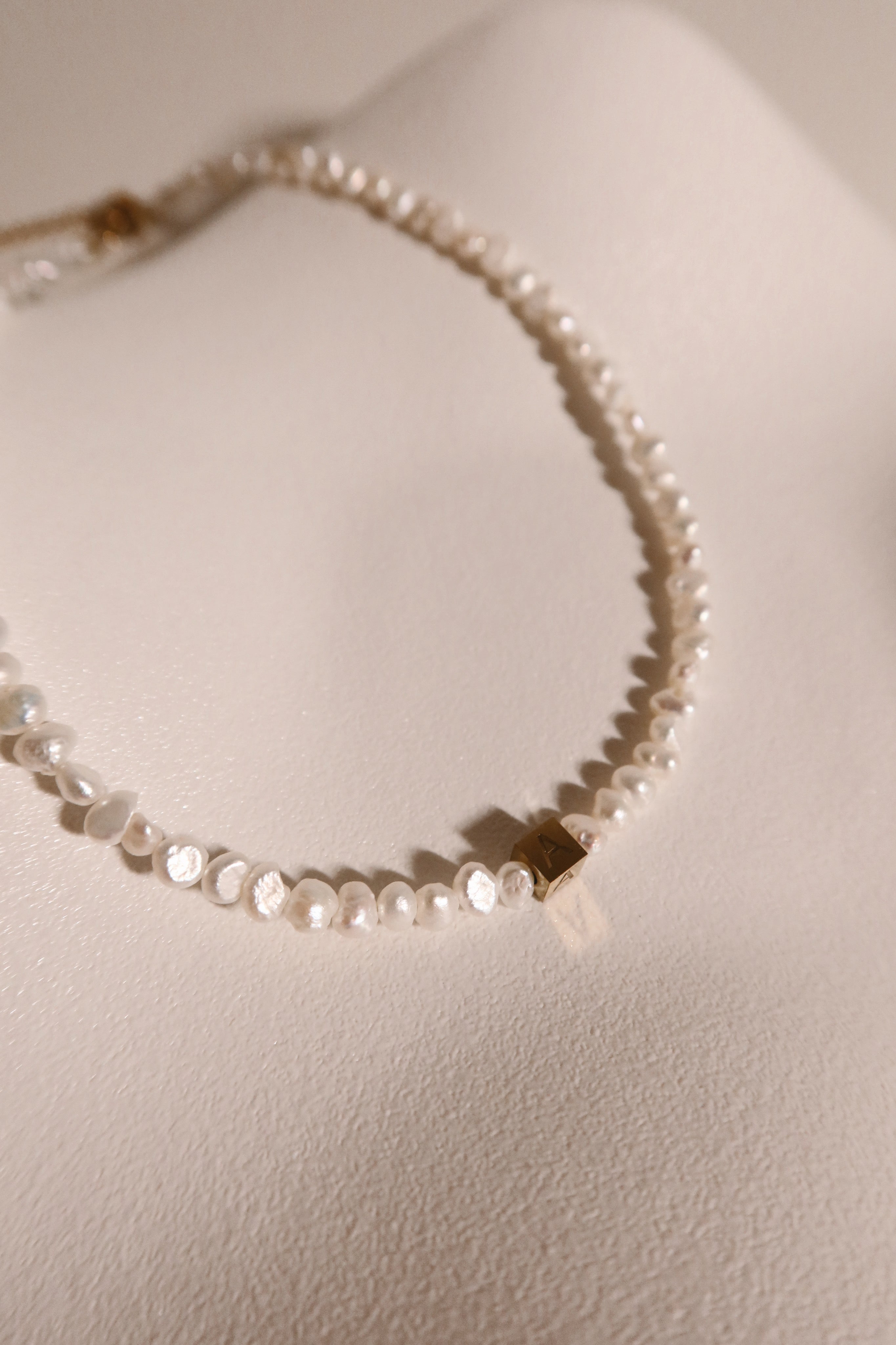 Rocks Initial pearl necklace