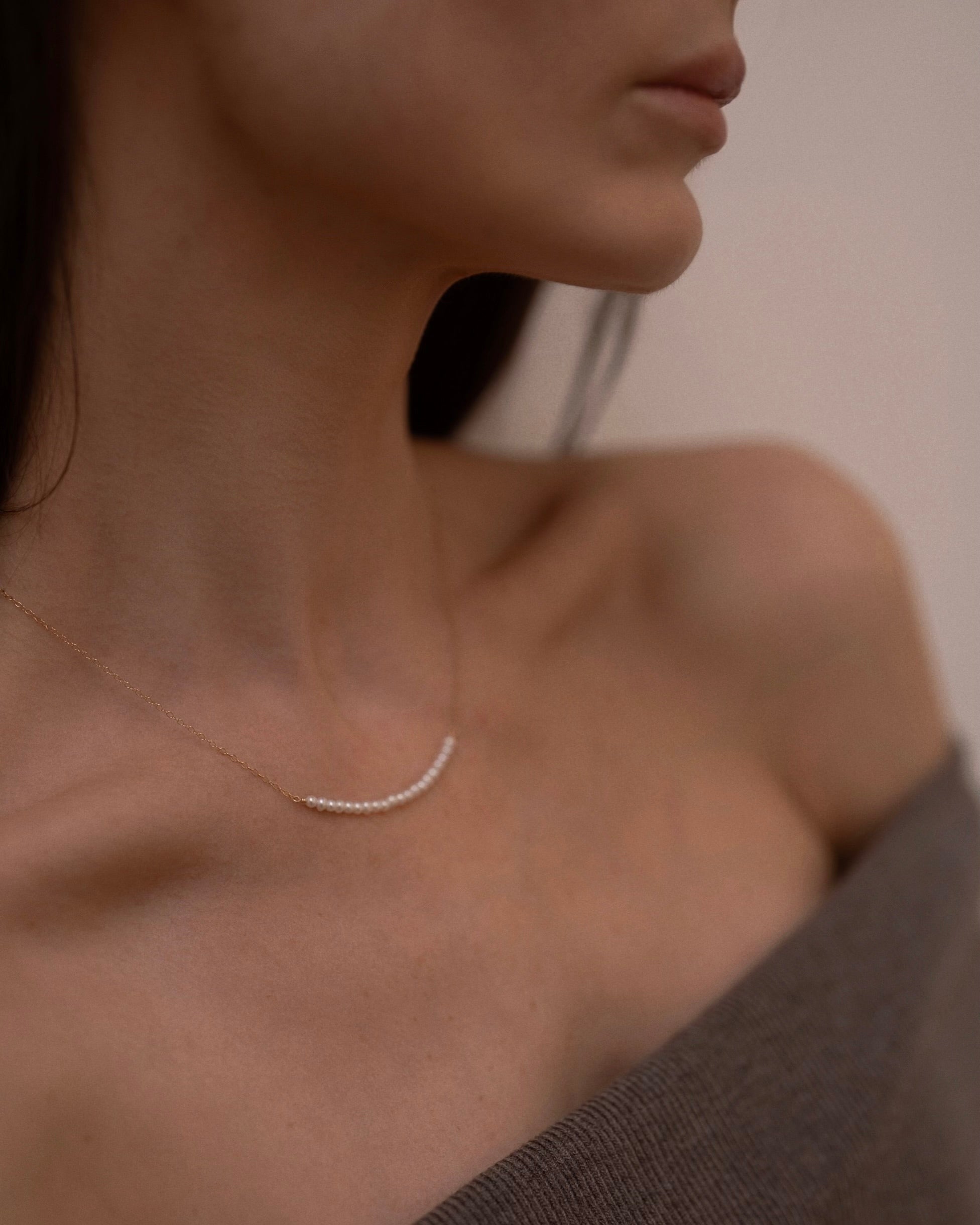 Smiley pearl necklace