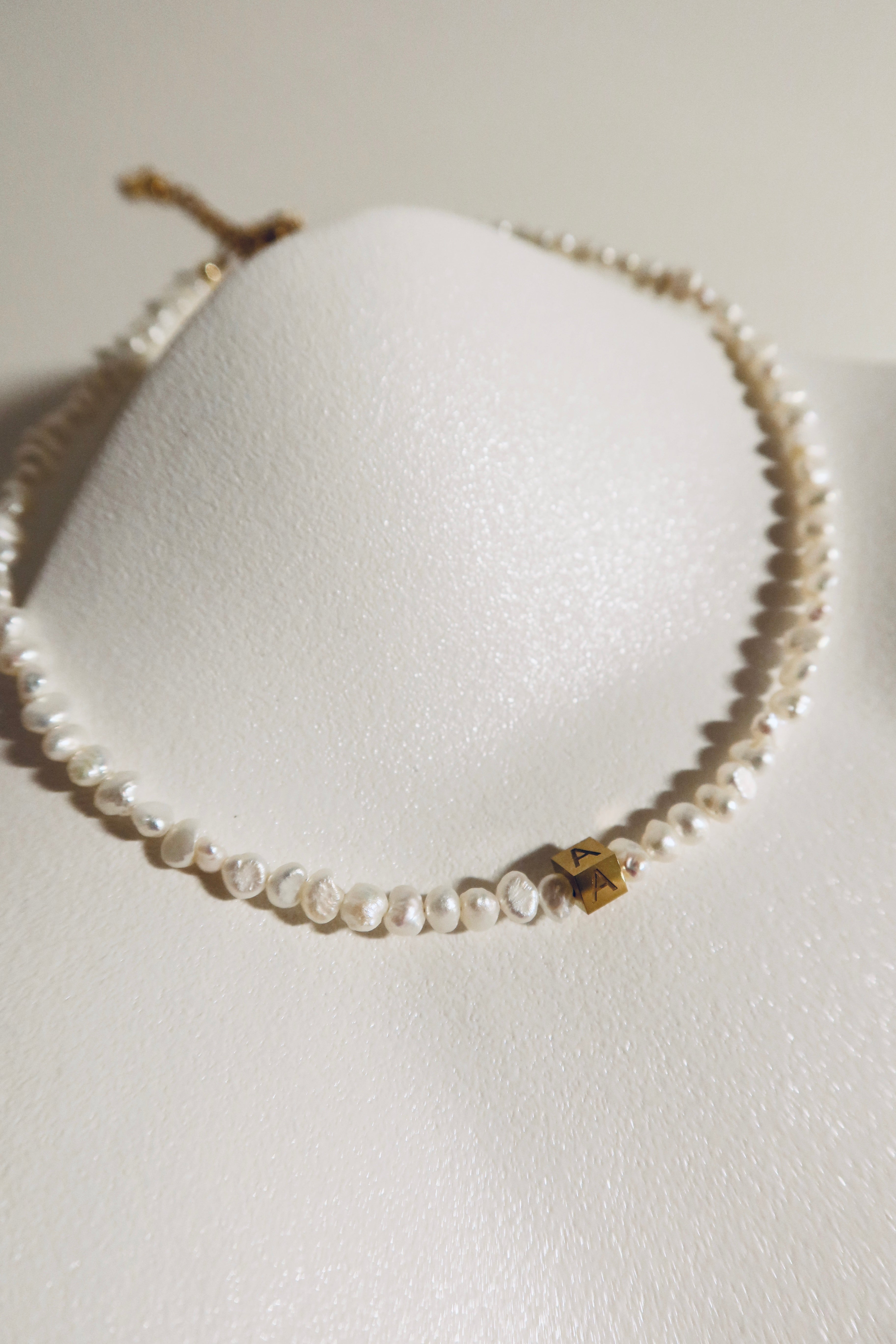 Rocks Initial pearl necklace