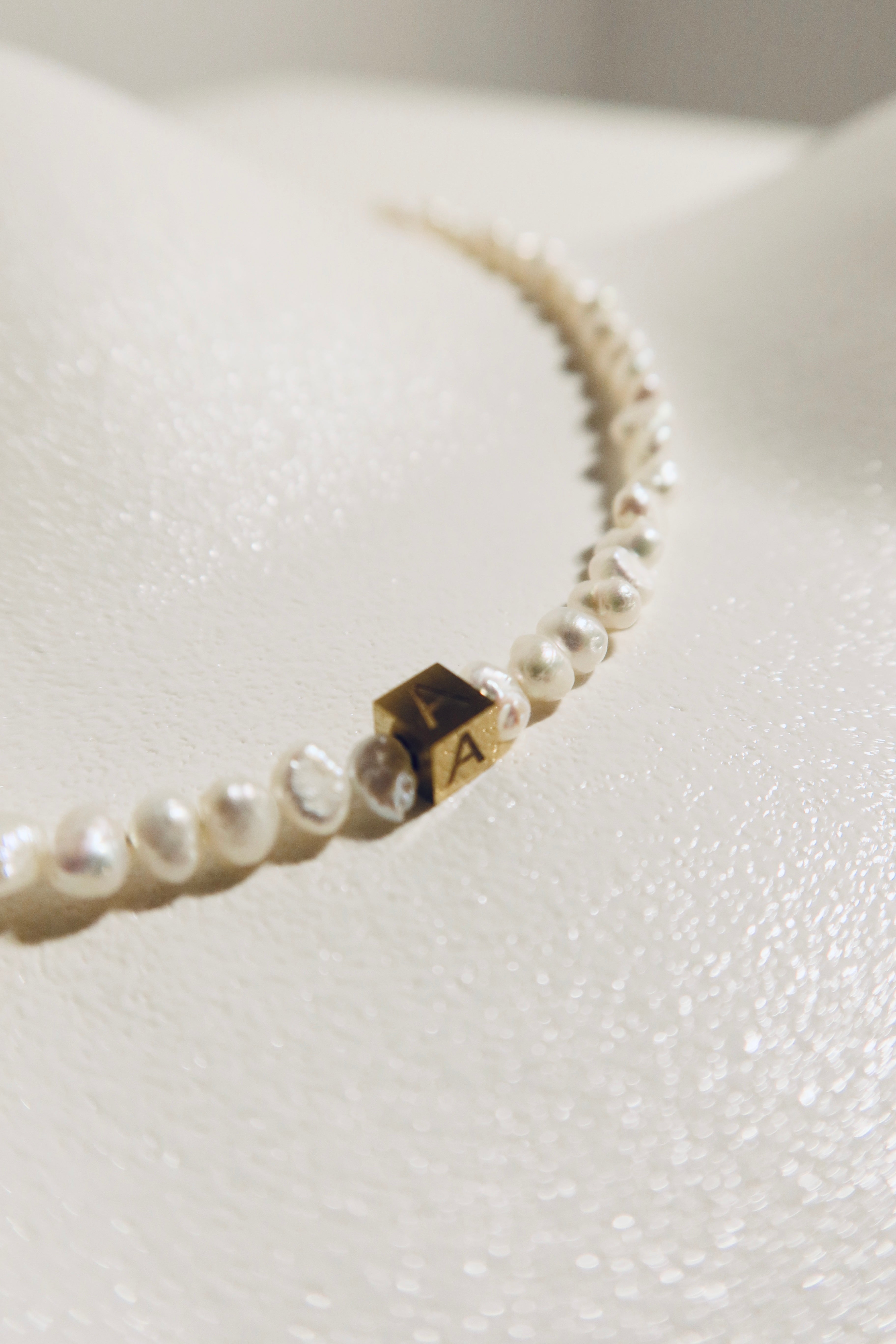 Rocks Initial pearl necklace