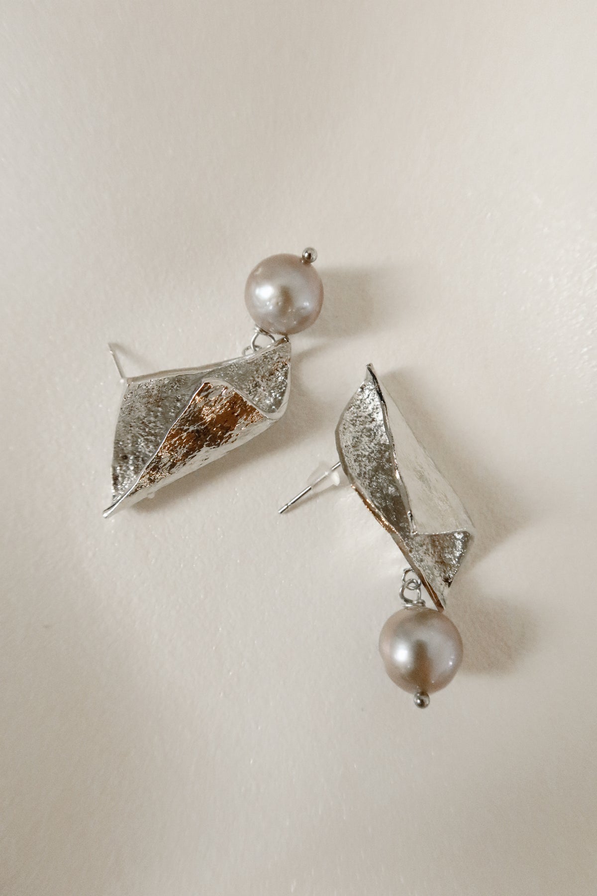 Bent Silver pearl earrings