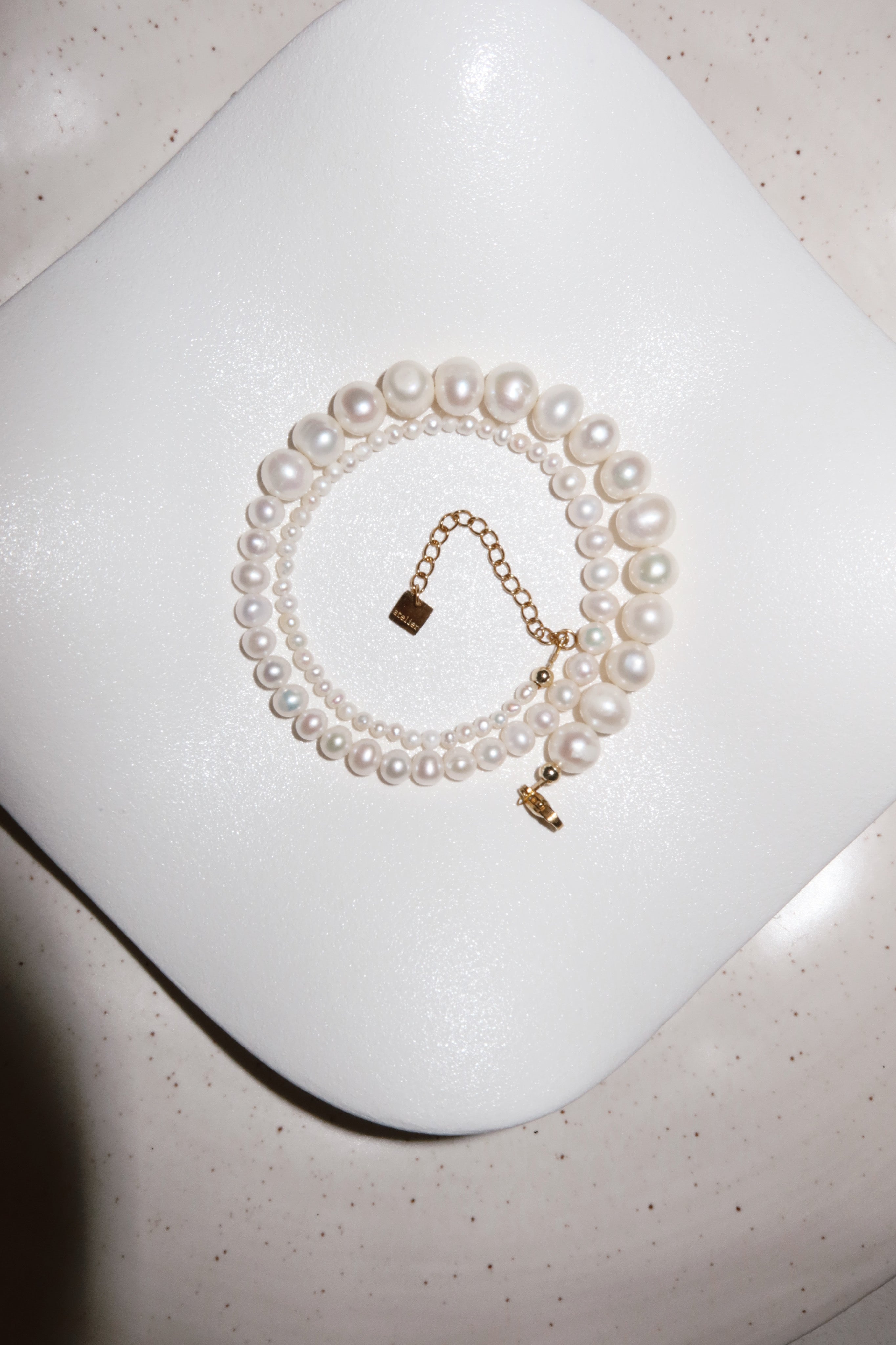 Triptych pearl necklace