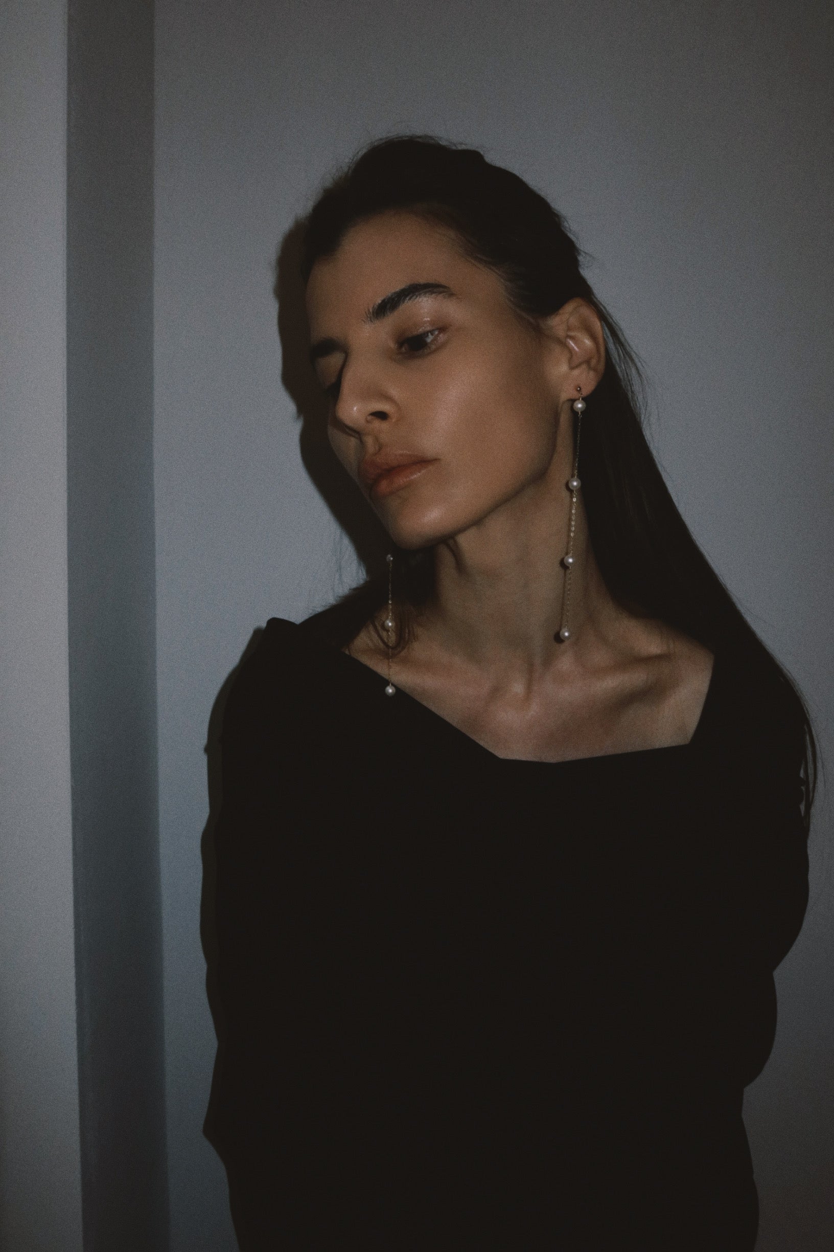 Nine pearl earrings
