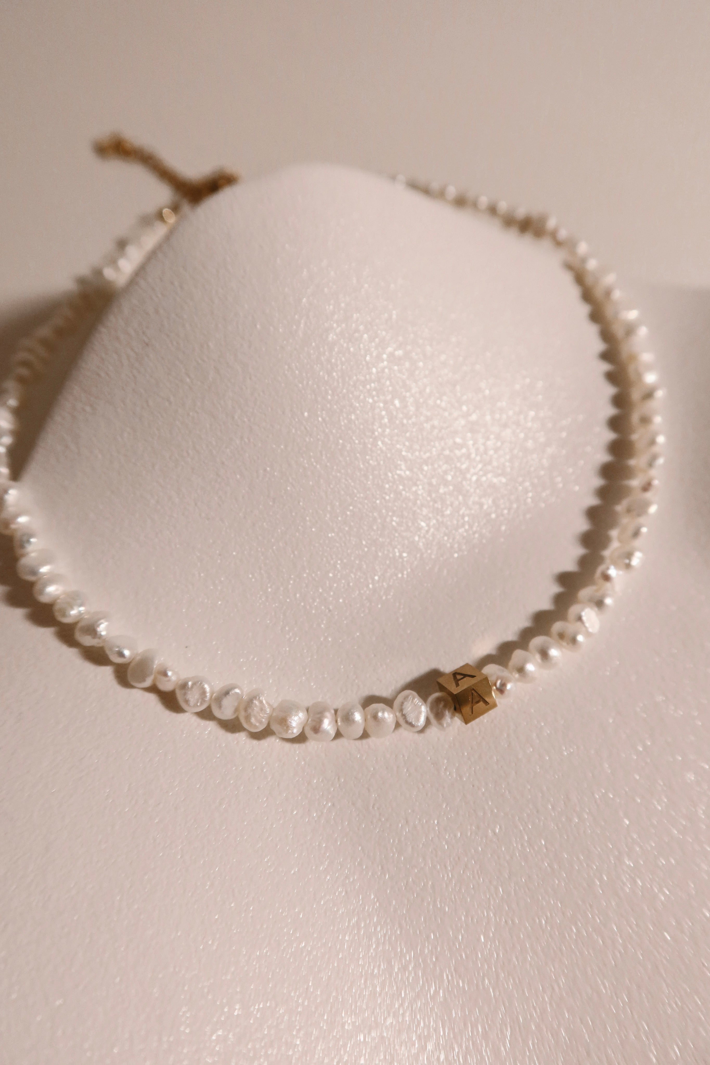 Rocks Initial pearl necklace