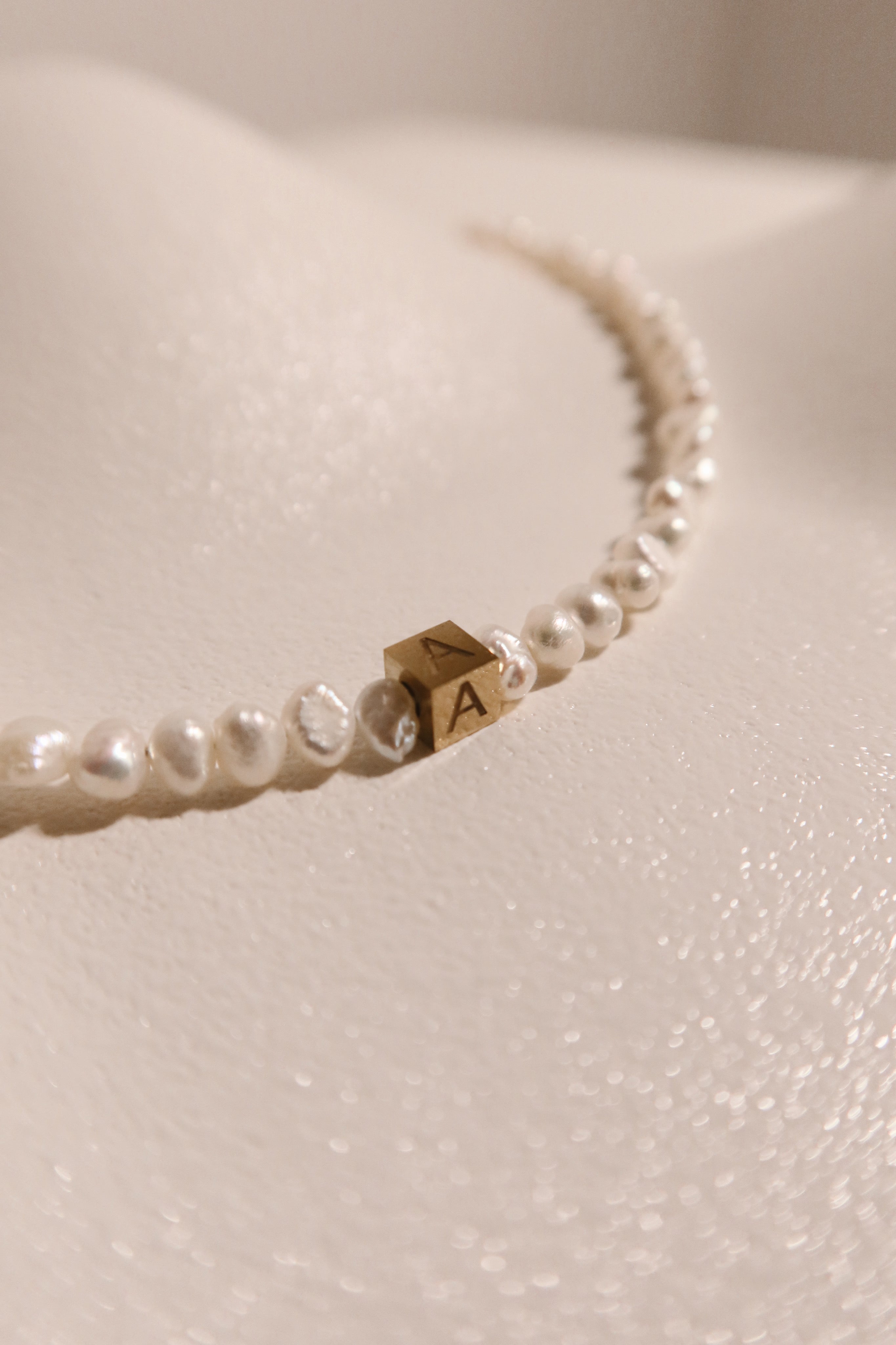 Rocks Initial pearl necklace