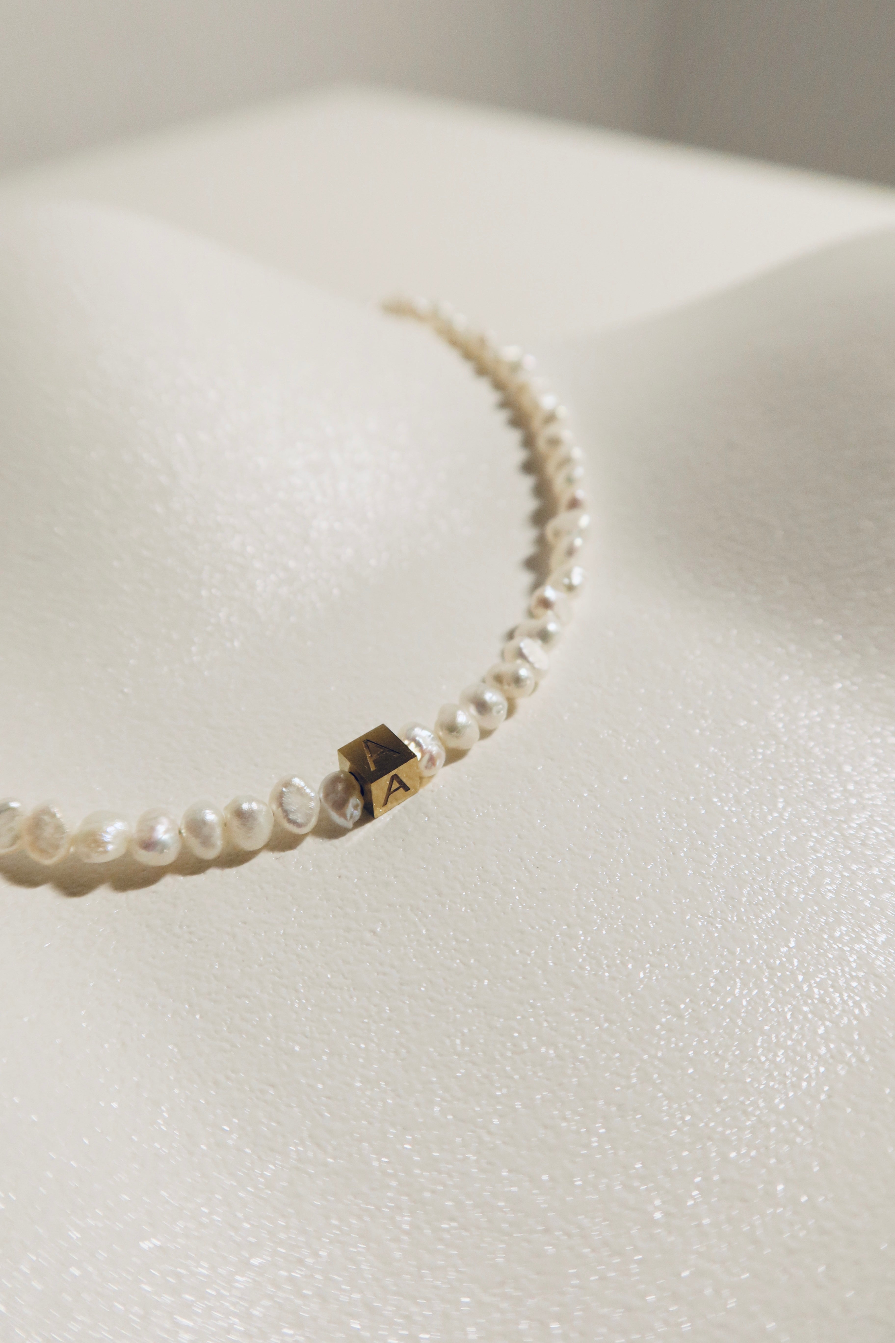 Rocks Initial pearl necklace