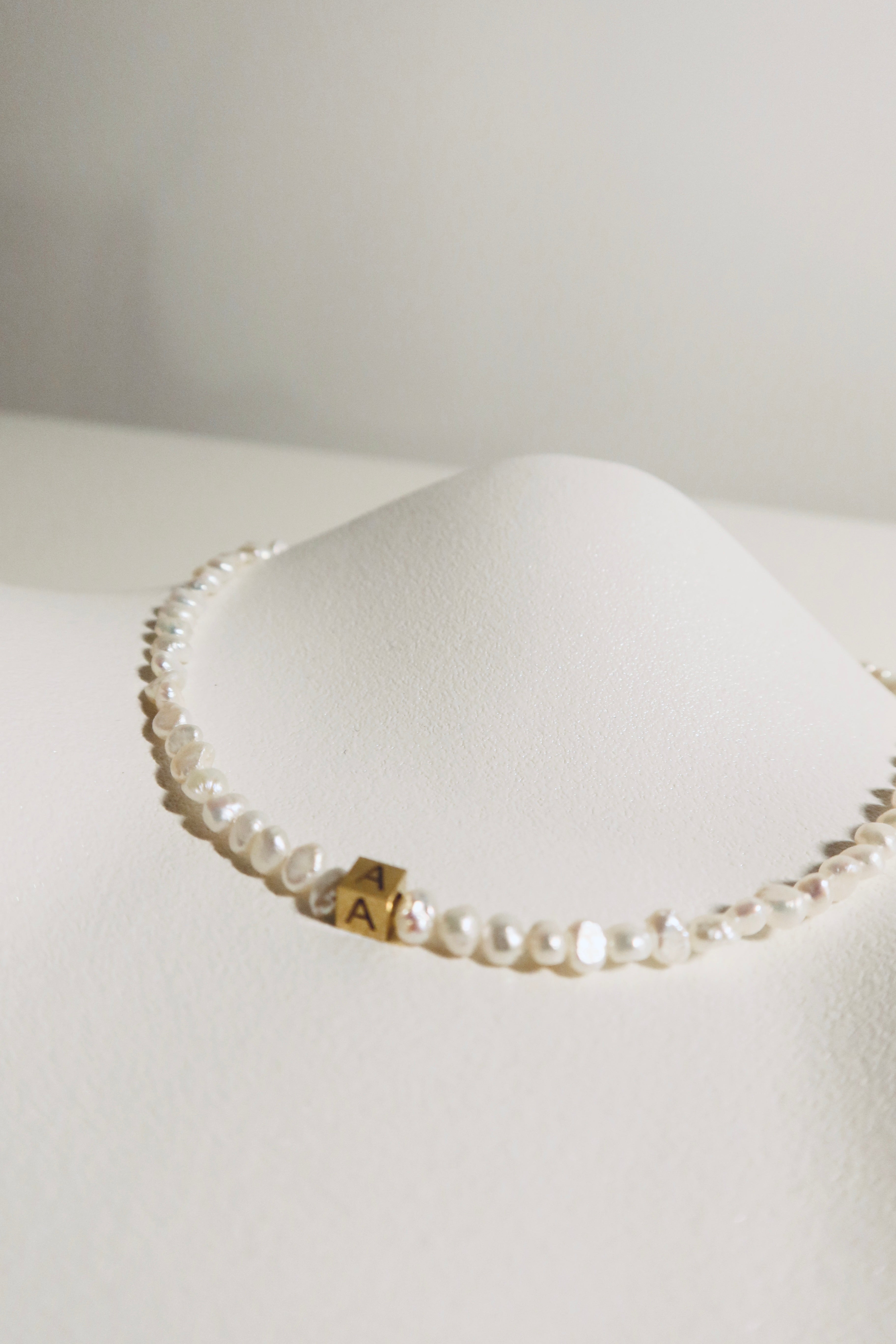 Rocks Initial pearl necklace