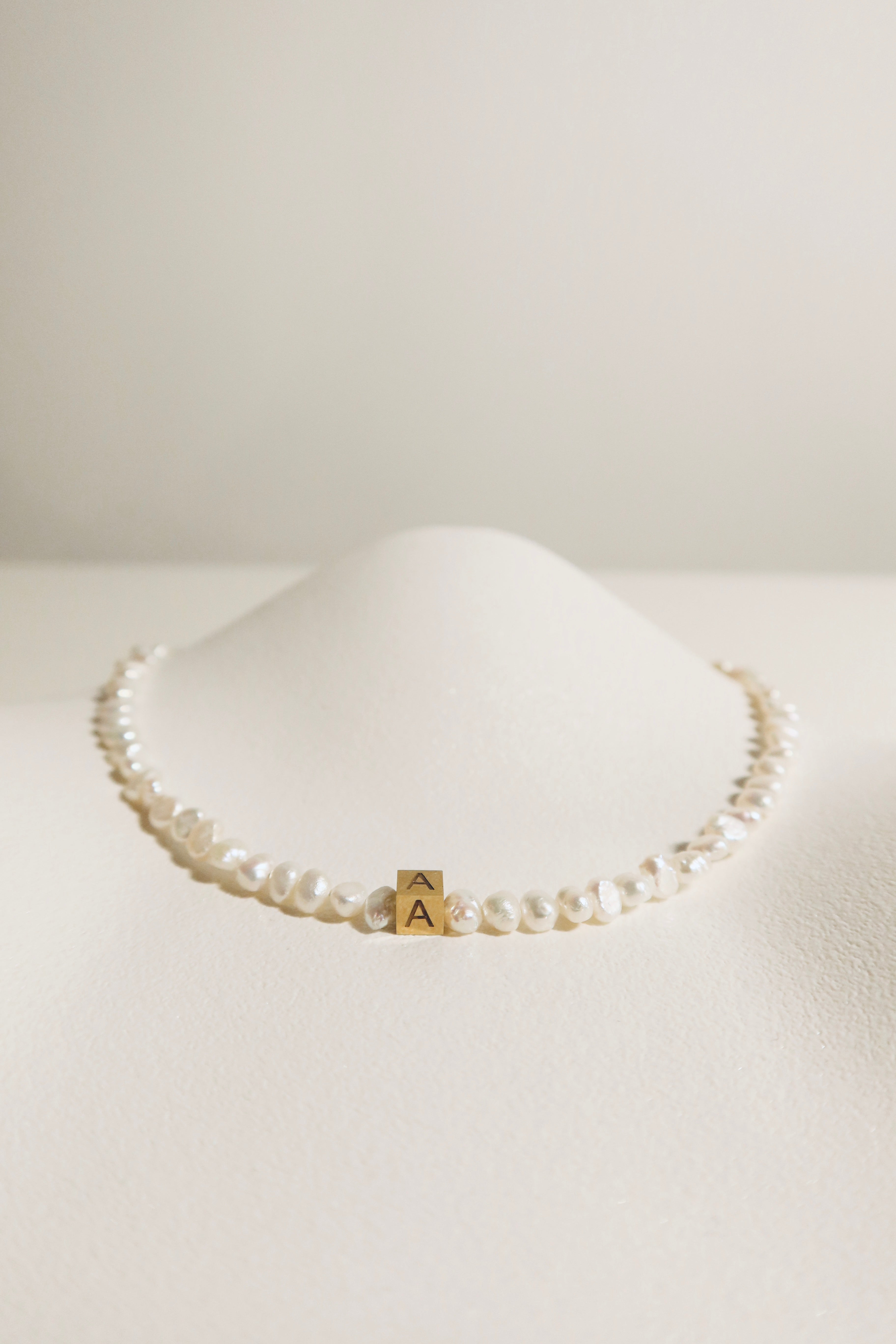 Rocks Initial pearl necklace