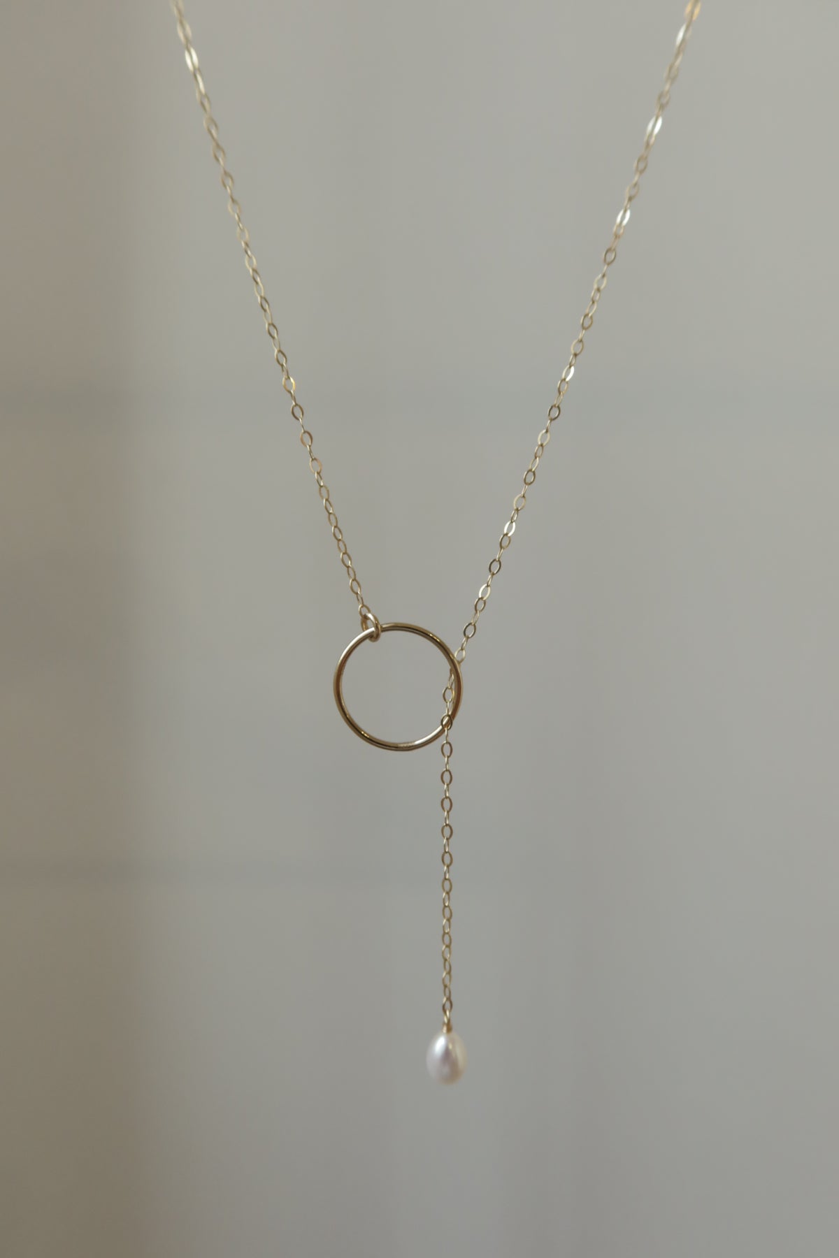 Label pearl necklace