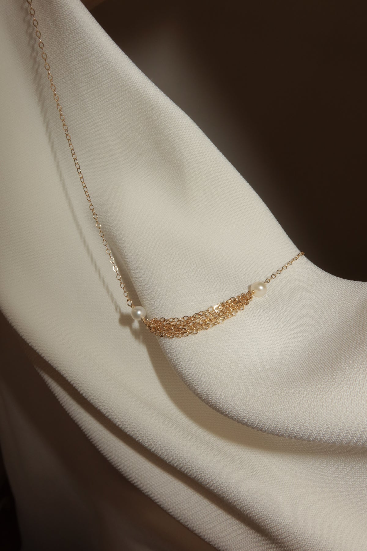 Saddle pearl necklace