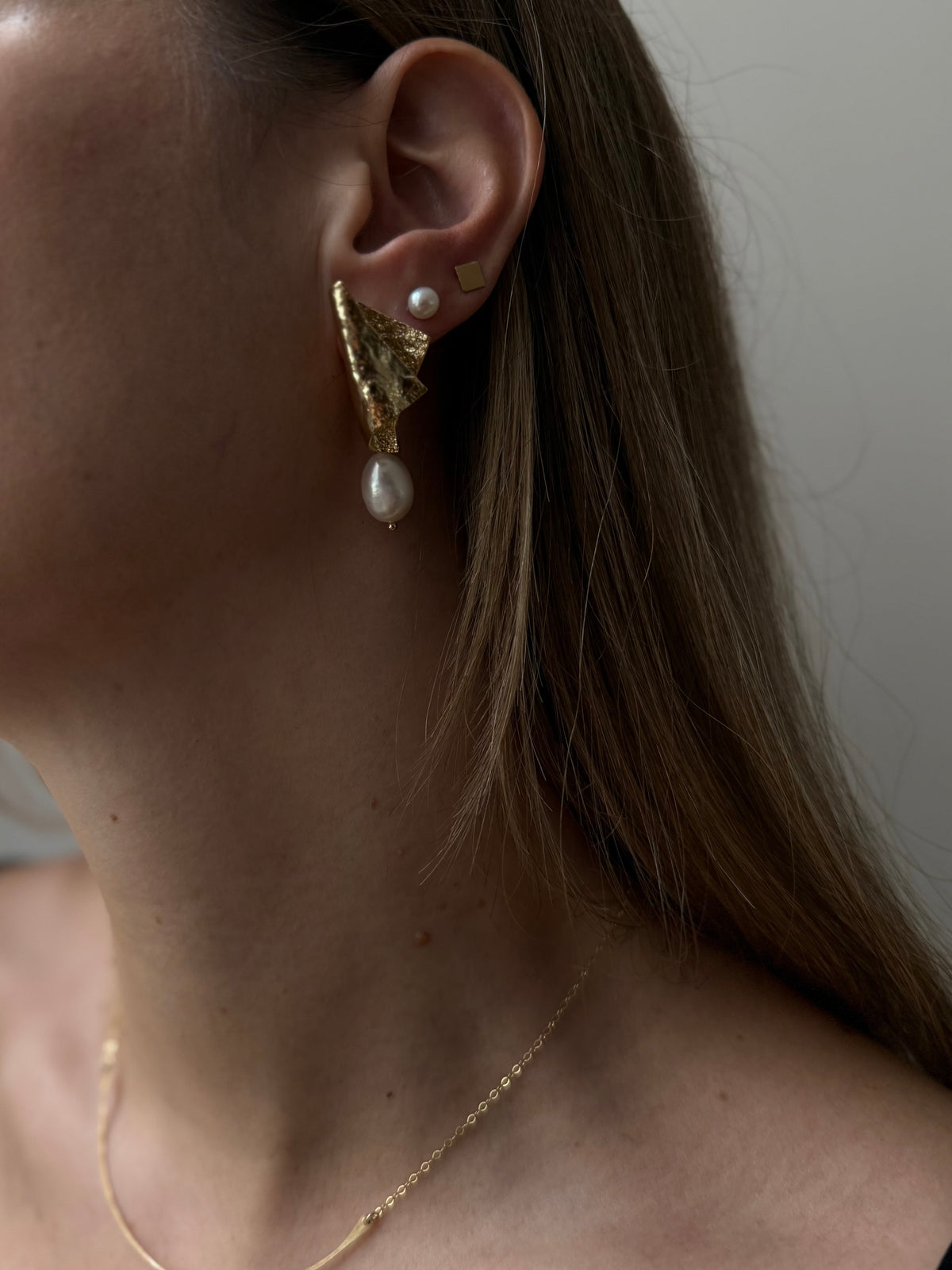 Bent Gold pearl earrings