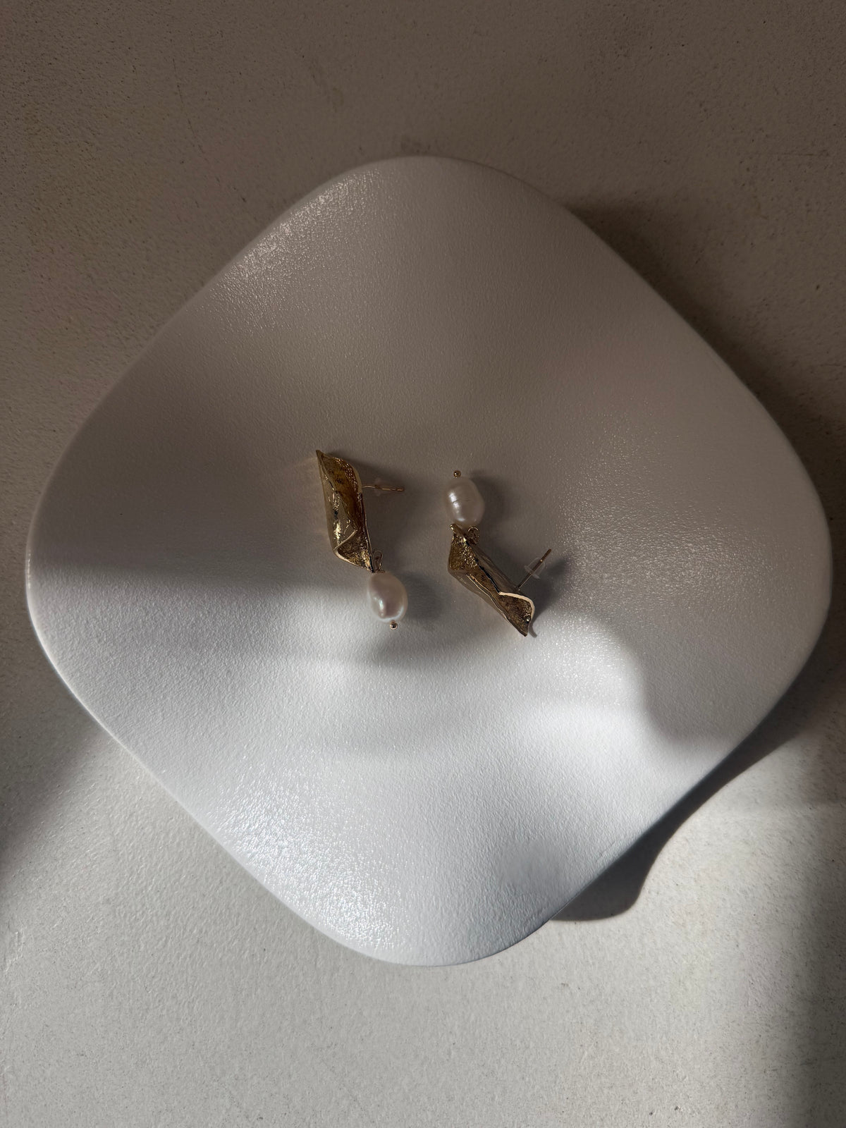 Bent Gold pearl earrings
