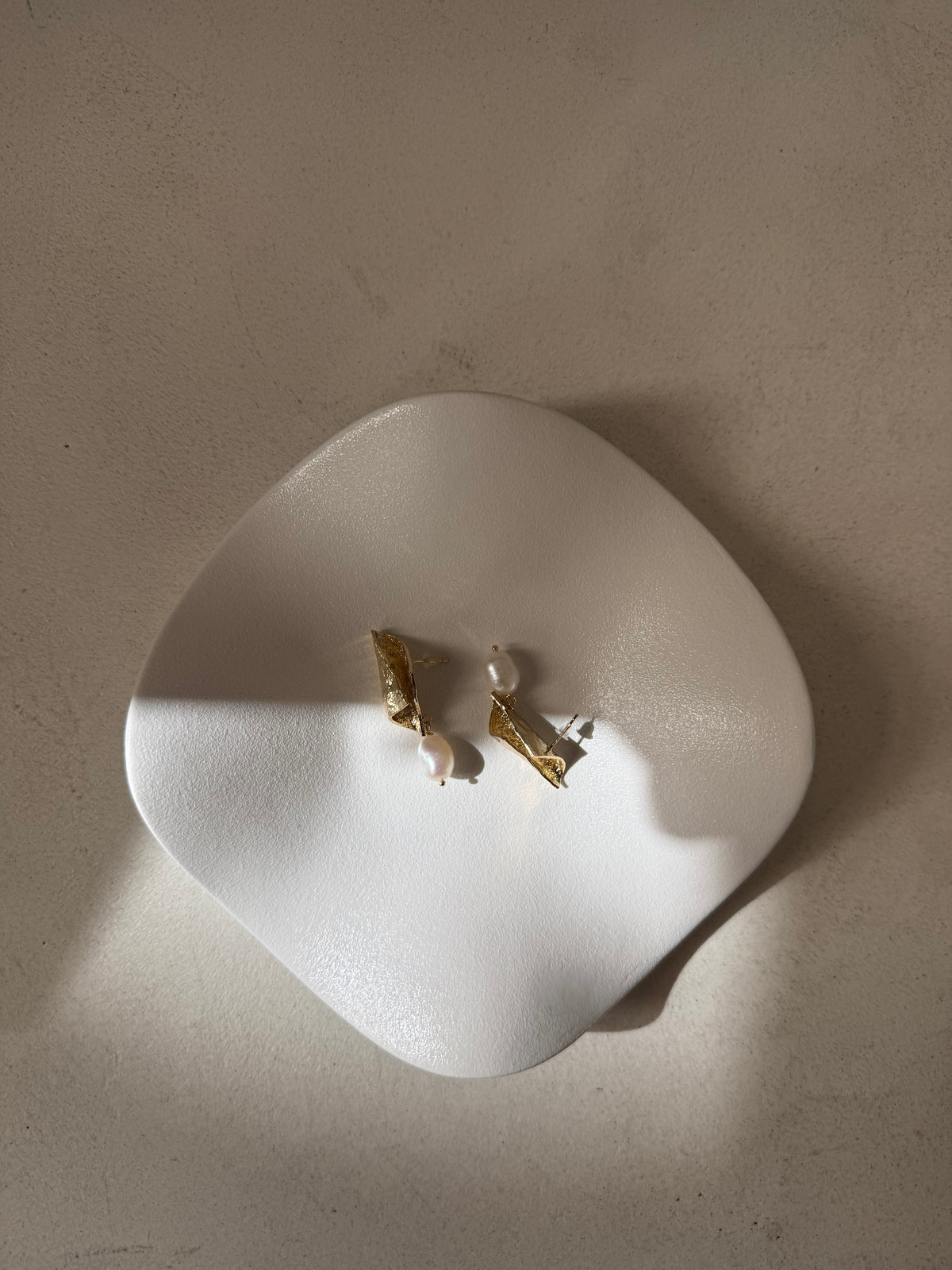 Bent Gold pearl earrings