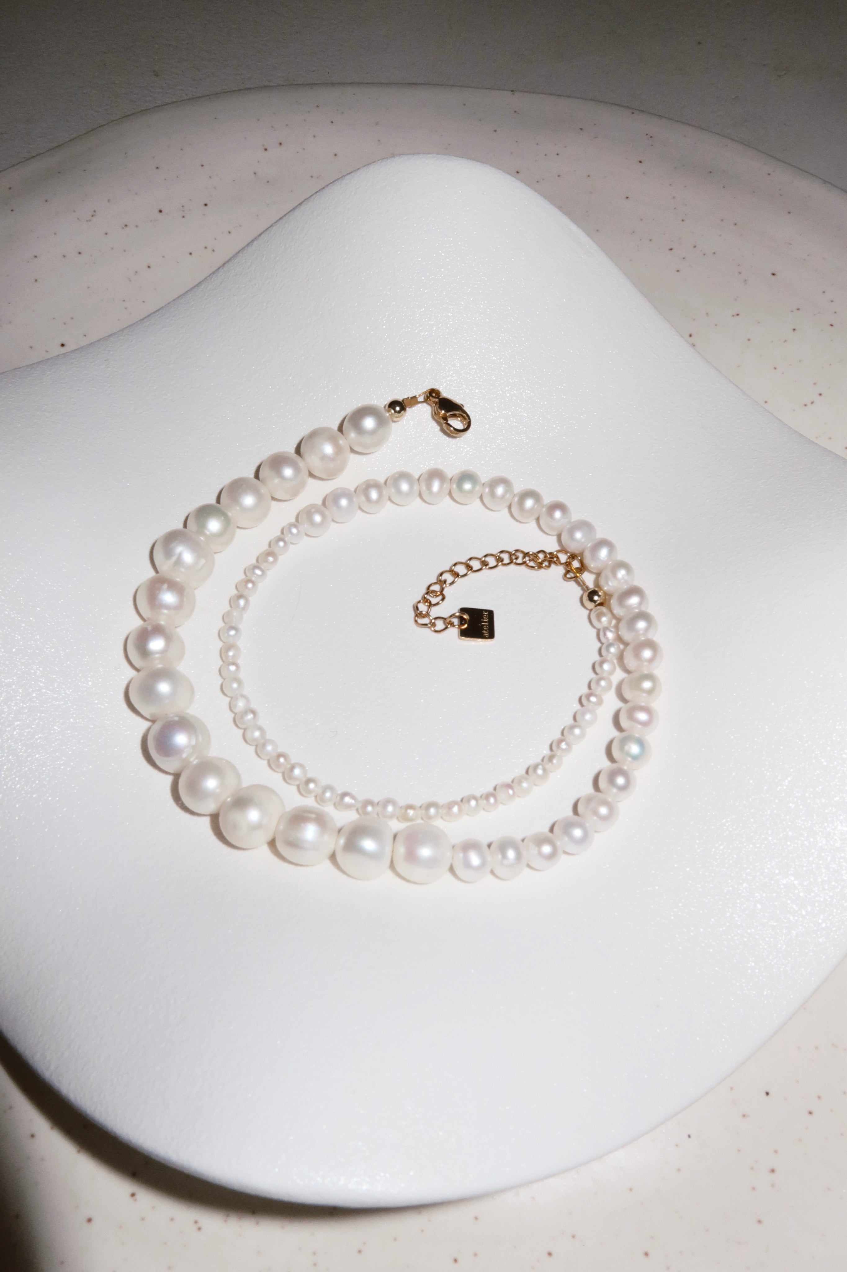 Triptych pearl necklace