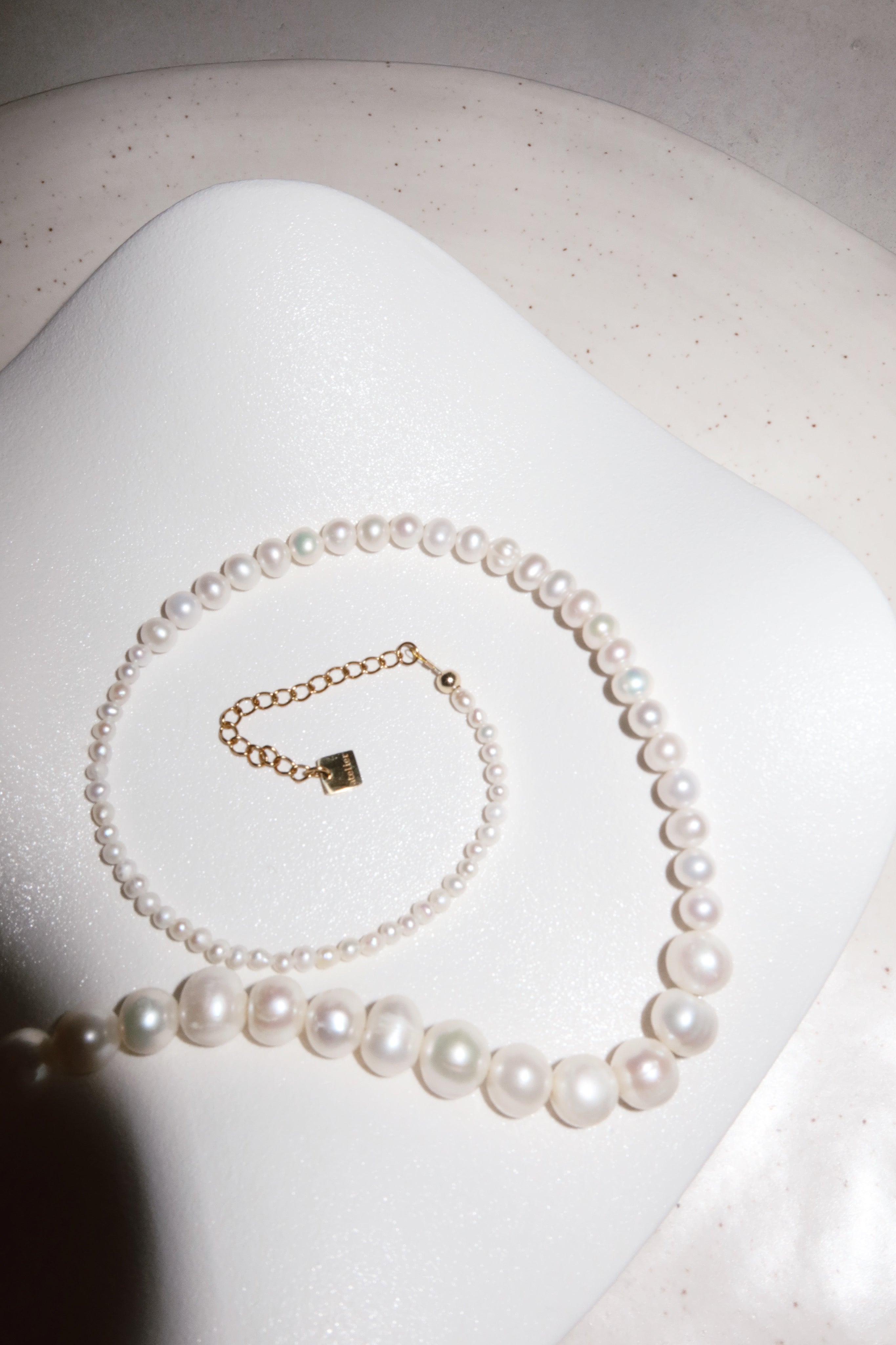 Triptych pearl necklace